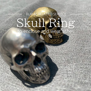 Skull ring containing remains